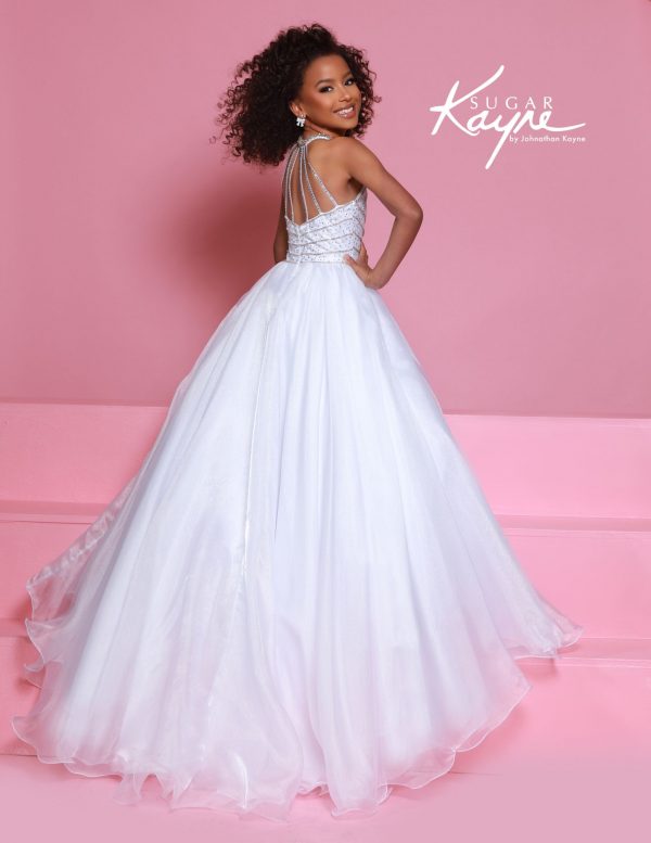 Back view of a white sugar kayne girls halter gown with multi-strap detailing and sparkle accents - ideal for stage presence and regal exits.